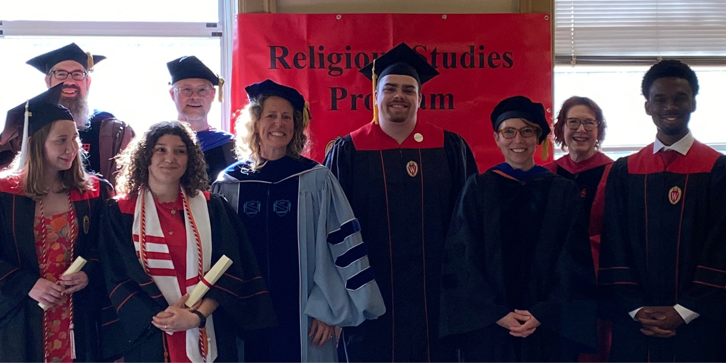 Graduates pose for a picture