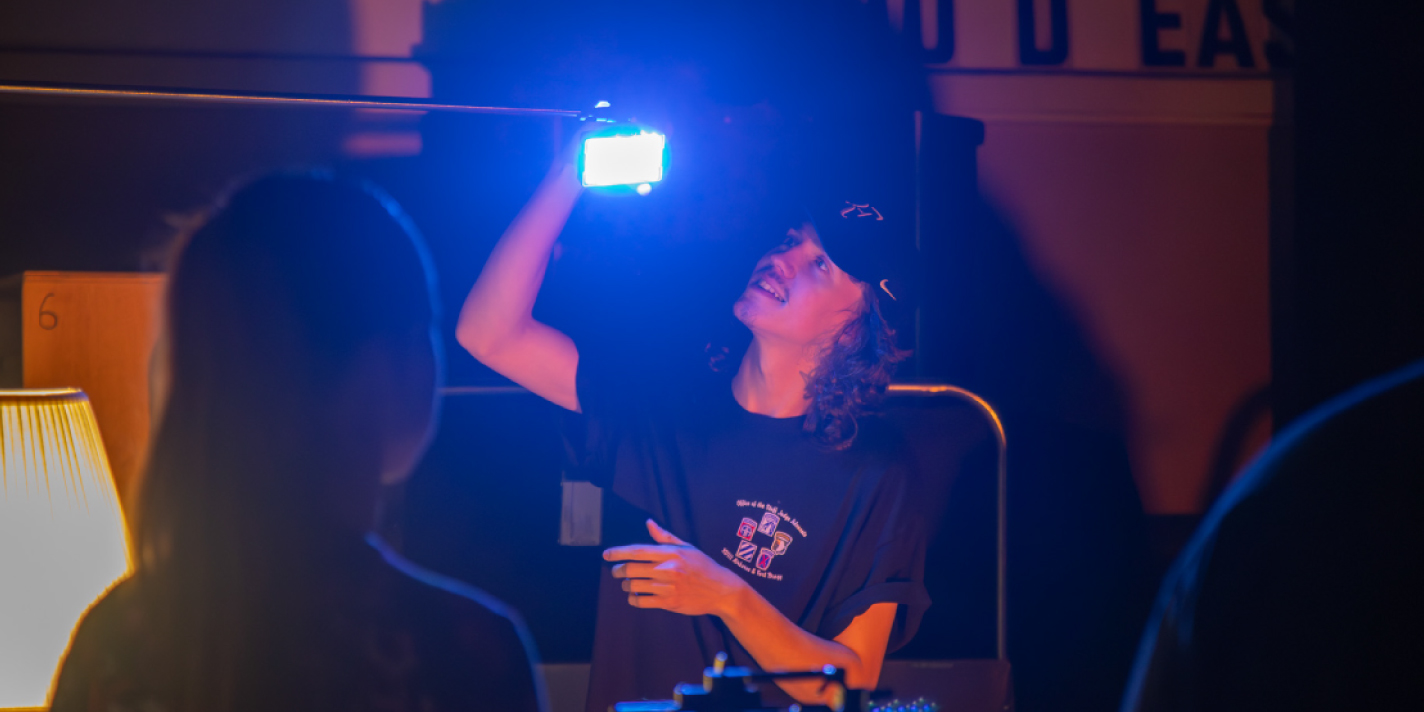 Student is shown working with a light